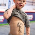 Child drawing on himself